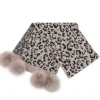 Marie Dumas Leopard Print Scarf with Fox Pompoms
